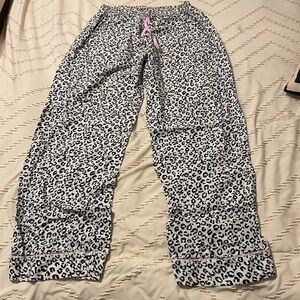 Victoria's Secret Snow Leopard Pajama Pants with pink trim. EUC size small
